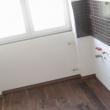 foto po zazdění průchodu,nových omítkách,montáži kuch.obkladu a  plovoucí podlahy-připraveno na montáž kuch.linky